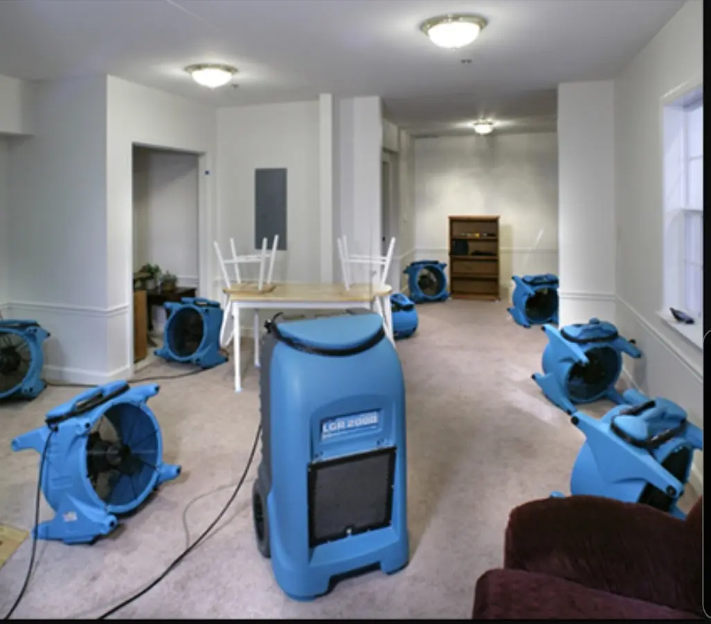 Air movers and dehumidifier setup for Water Damage Restoration in University Park